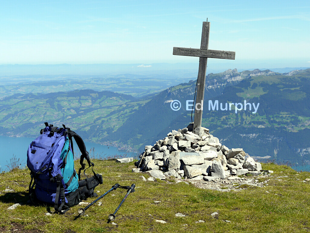The summit cross and cairn on the Dreispitz