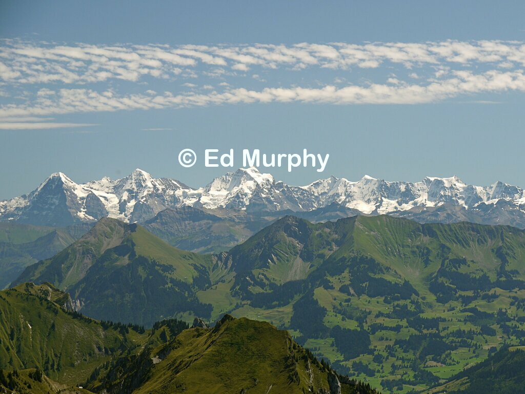 Eiger, Mönch and Jungfrau beyond the Niesen chain