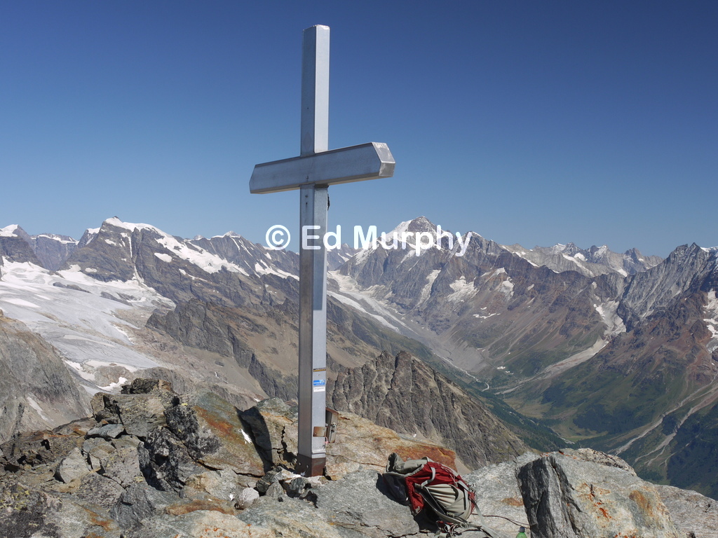The Hockenhorn's summit cross and the view to the Aletschhorn