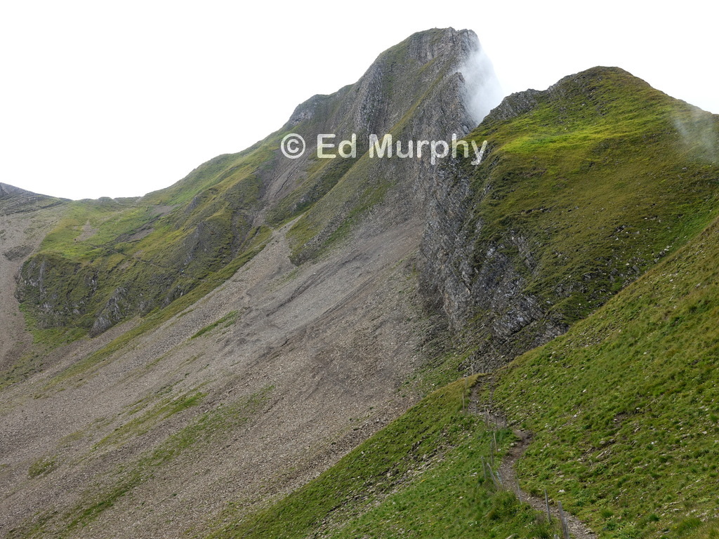 Tilted strata above the track leading to the saddle below the Brisen summit