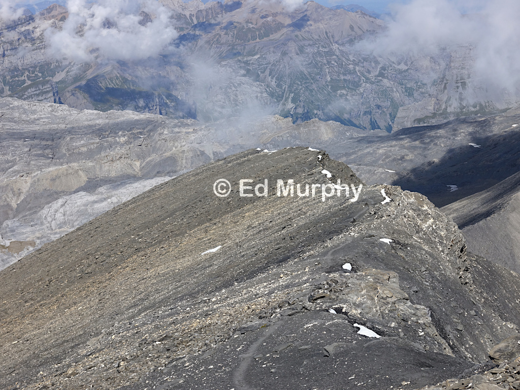 Looking down the easy track along the summit ridge of Mont Buet