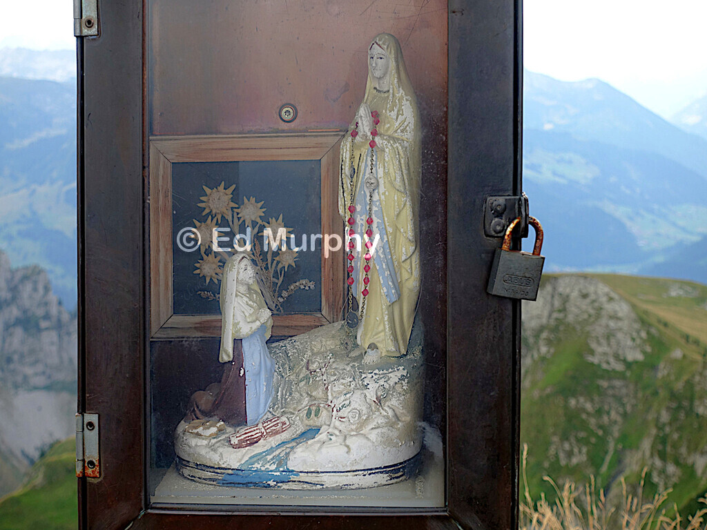 The devotional shrine affixed to the Widdergalm's summit cross